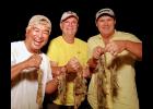 Captain Greg Peralta and friends pose with their catches on a recent social shrimping trip!